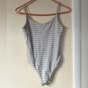Gray striped body suit